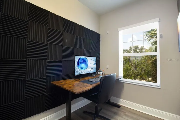 Primary bedroom closet is being used as an office