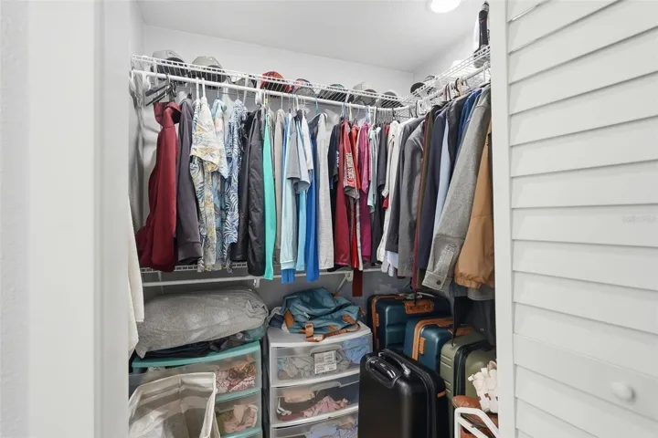 Primary bedroom walk-in closet 2