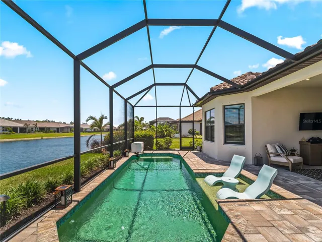 Soak up the Florida sunshine or relax in the shade beneath the covered seating area.