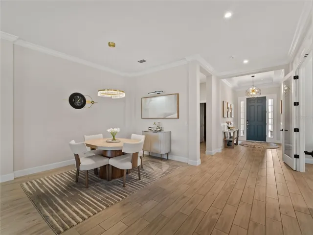 The spacious dining area flows seamlessly into the family room creating an open and connected layout.