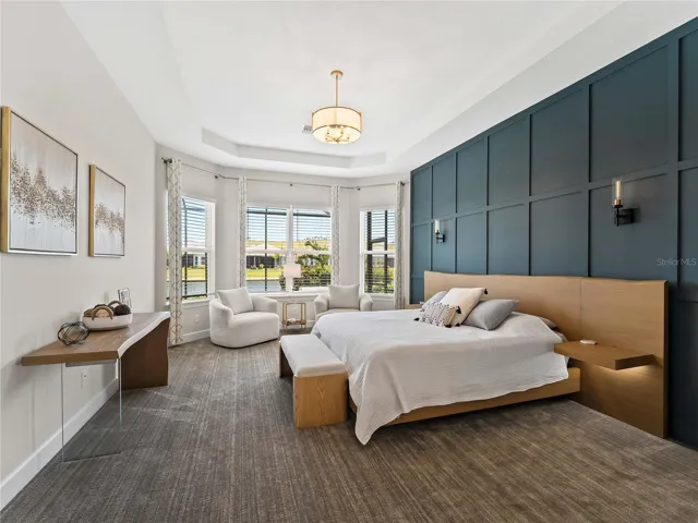 Primary bedroom features brand new carpeting, adding a soft, comfortable and luxurious feel to this relaxing retreat.