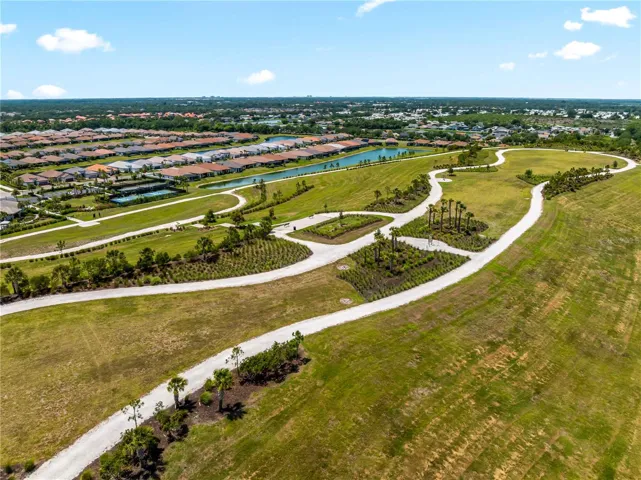 Enjoy scenic hiking and walking trails located behind the home, offering peaceful nature views and outdoor enjoyment.