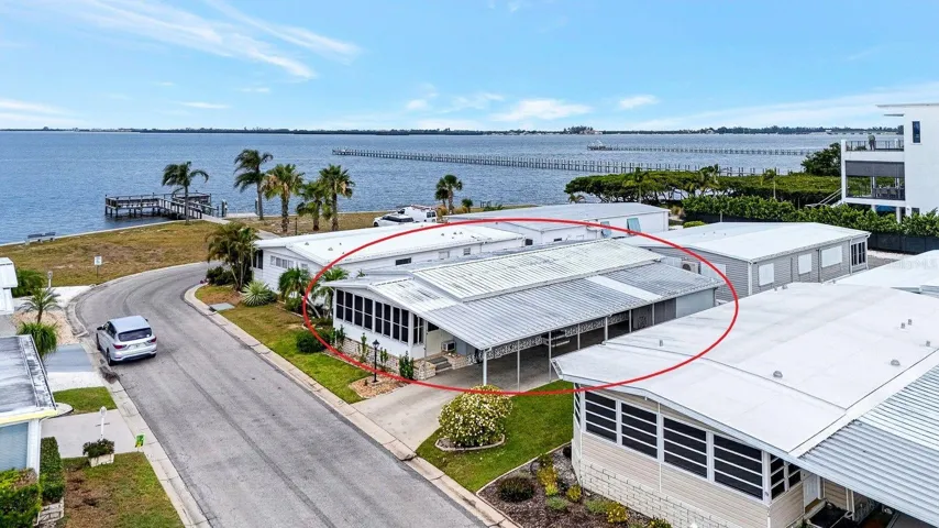 Aerial view showing home and bay