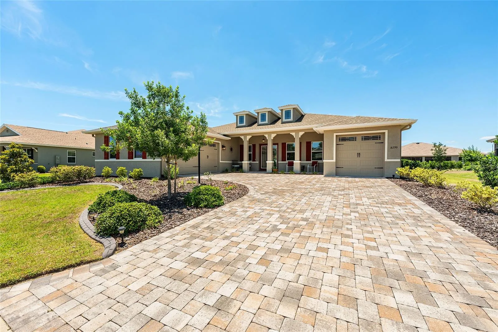 Beautiful 2021 Aberdeen Model in West Kestrel of Candler Hills with exceptional curb appeal, professional landscaping, paver driveway, welcoming front porch, Zoysia grass, full-yard irrigation, concrete curbing, gutters, and leaders. This desirable floor plan offers two primary suite options, plus Hunter Hydrawise irrigation for added convenience.