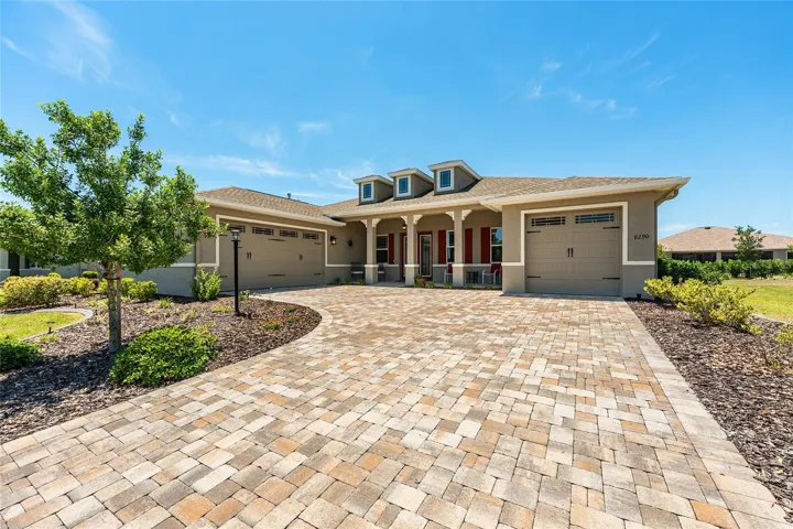 Beautiful 2021 Aberdeen Model in West Kestrel of Candler Hills with exceptional curb appeal, professional landscaping, paver driveway, welcoming front porch, Zoysia grass, full-yard irrigation, concrete curbing, gutters, and leaders. This desirable floor plan offers two primary suite options, plus Hunter Hydrawise irrigation for added convenience.