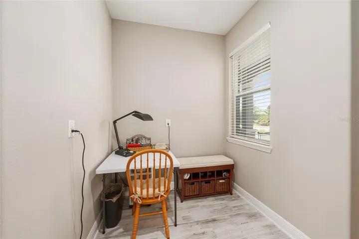 Convenient flex space located off the two-car garage and near the pantry—perfect as a second office, mudroom, or everyday drop zone.