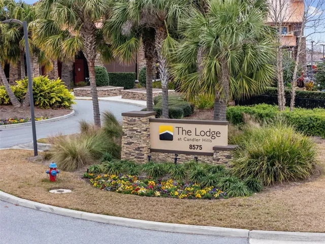 Enjoy the Candler Hills clubhouse amenities, including a pool, fire pit, and relaxing golf course views.