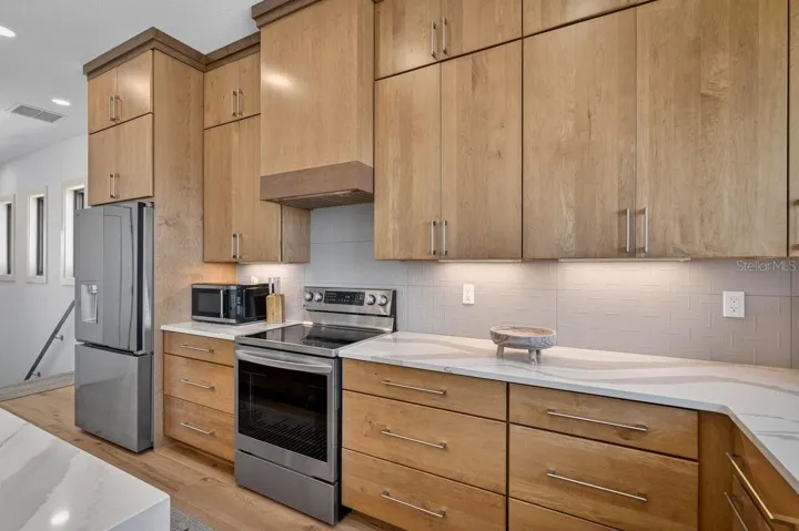 Wood Cabs & Quartz Countertops