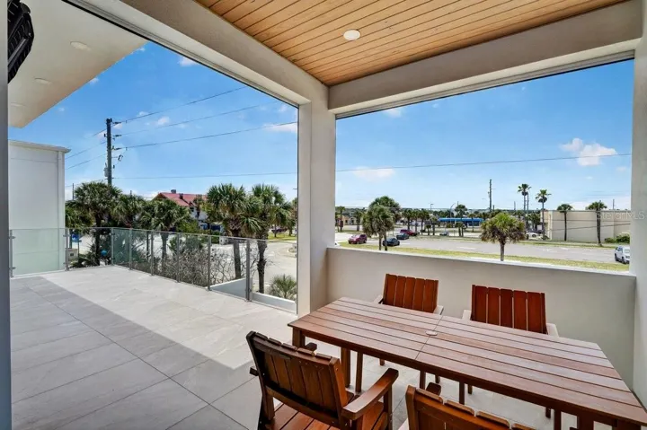 West Facing Balcony with Elecrtric Screens and shutter