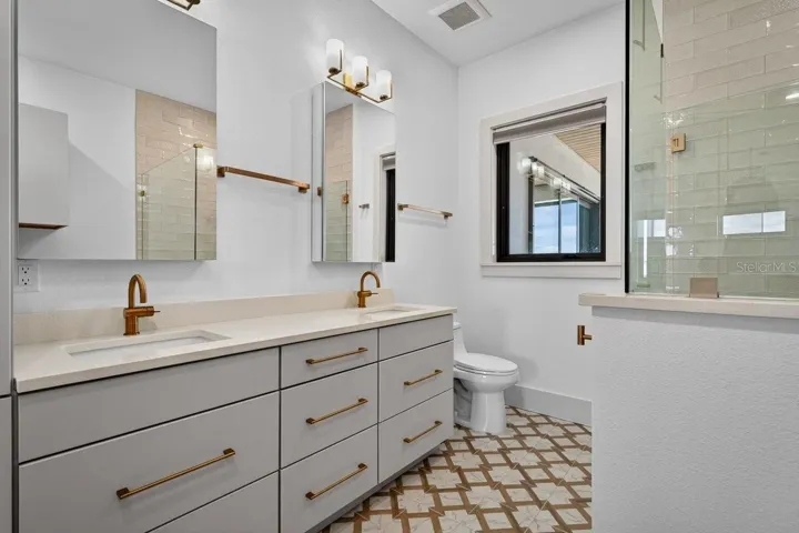 Primary Bath with double vanity & ocean views