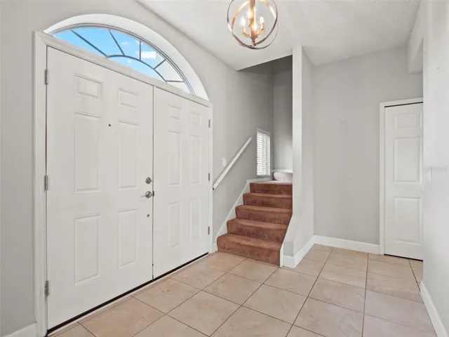 Foyer View with Double Door Entry.
