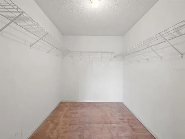 Primary walk in closet.