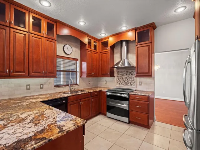 Beautiful Wood Cabinets and Granite Counters.