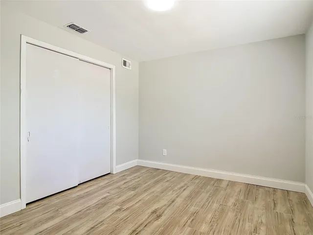 the second bedroom has a double closet