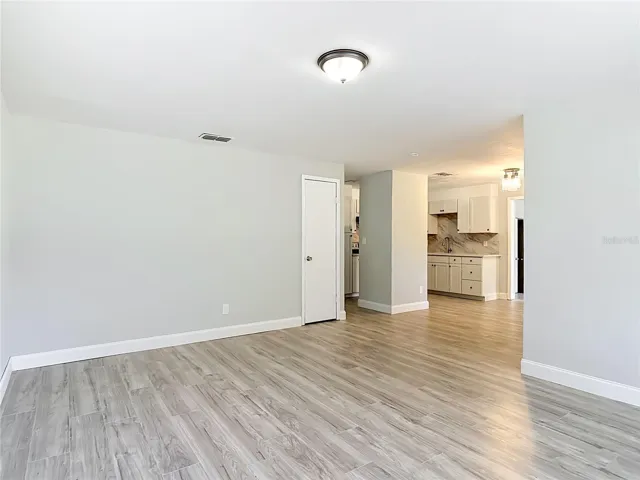 this is the living room looking to the kitchen