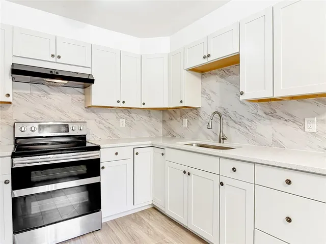 the kitchen has a lot of storage