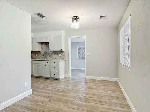 the living room opens to the dining room