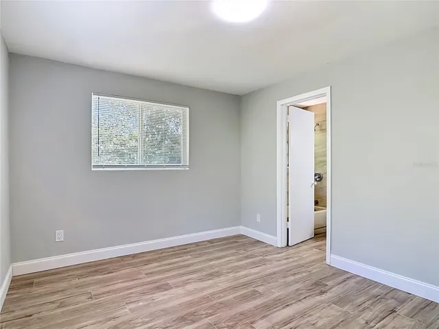 the door to the main bedroom bathroom