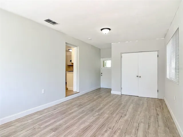 the rear of the bonus room is the laundry area