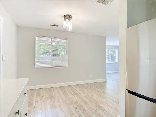 the dining room opens to the kitchen