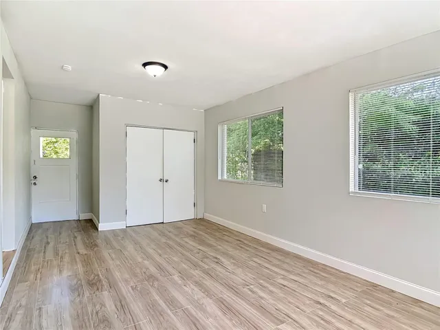 the doorway in the rear of the bonus room is to the back yard