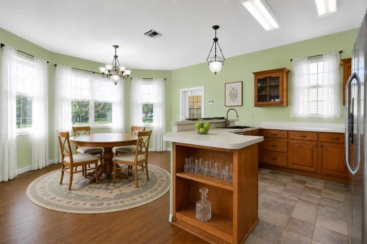 Dining room/kitchen   Virtually staged photo