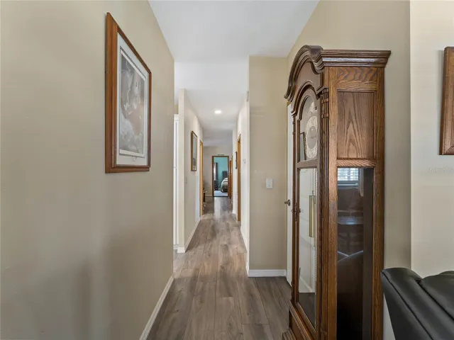 Hallway from living room to primary bedroom