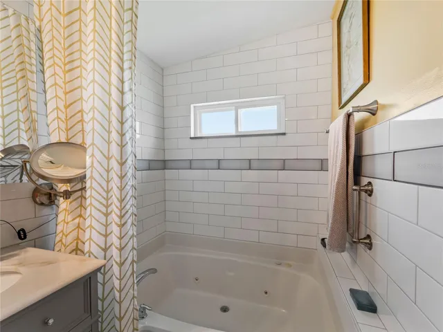 Whirlpool tub in primary ensuite bathroom