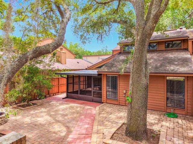 Outdoor paved backyard perfect for entertaining