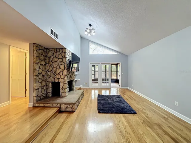 Living Room with Wood Burning Fire Place