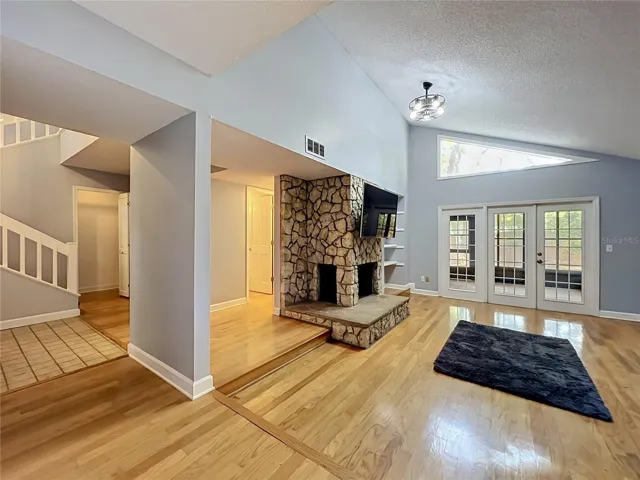 Living Room with Wood Burning Fire Place