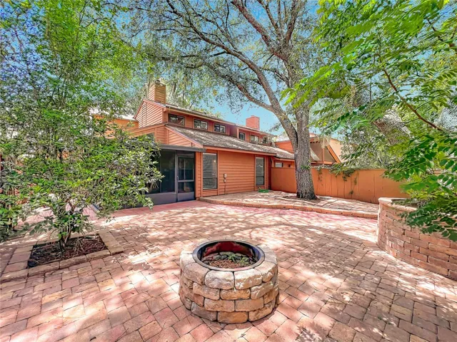 Outdoor paved backyard perfect for entertaining
