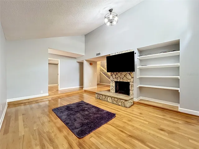 Living Room with Wood Burning Fire Place