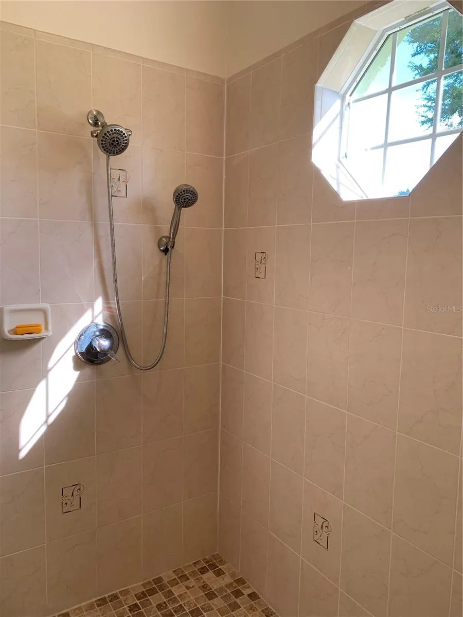 Large master walk in tiled shower