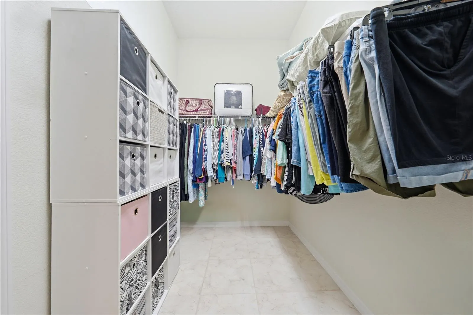Her closet - storage isn't an issue with this house