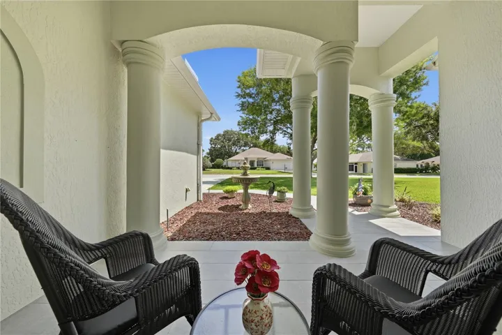 Unusual front porch feature comes with this home - dining room opens onto porch -warm and welcoming