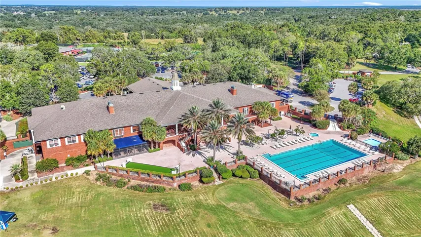 Jr Olympic size pool overlooking golf course and view of Lake Griffin