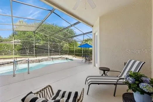 Large screen enclosed pool (refinished in 2022) and lovely patio to enjoy the great outdoors.