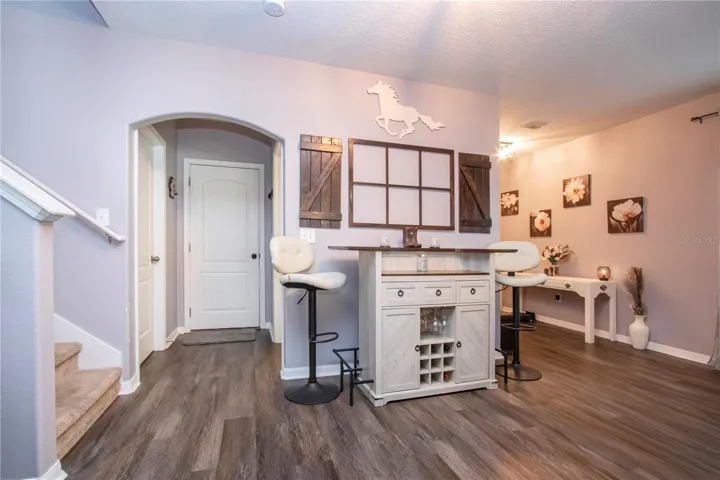 View Of The Bar Leading To The Garage And Laundry Room