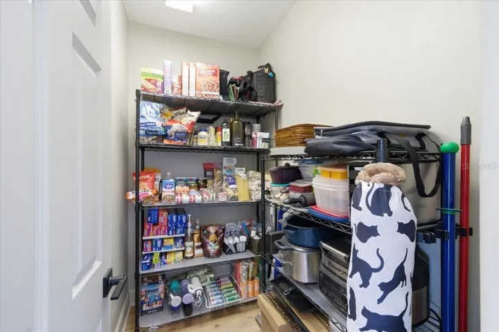 Walk in pantry/storage in laundry room.