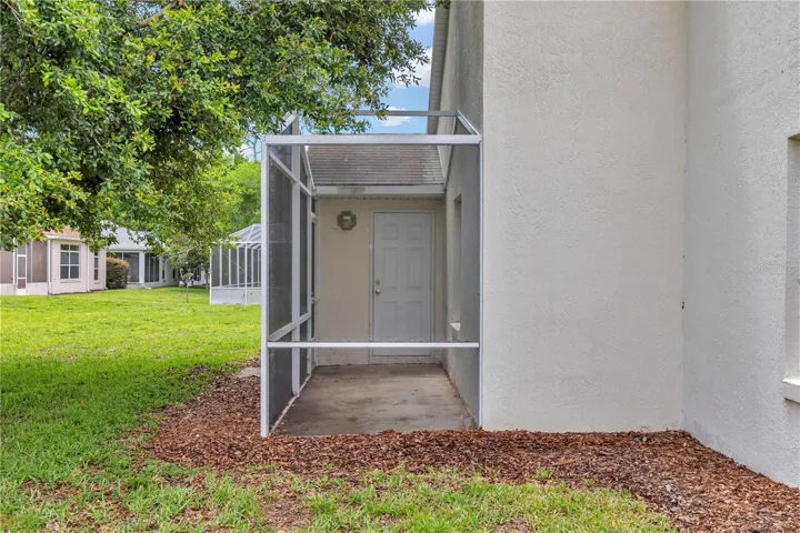 BIRDCAGE WITH ENTRANCE TO KITCHEN BREAKFAST AREA
