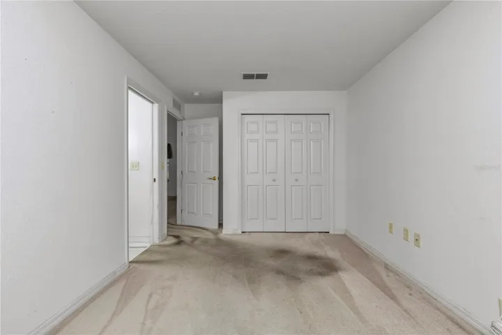 GUEST BEDROOM WITH BUILT IN CLOSET