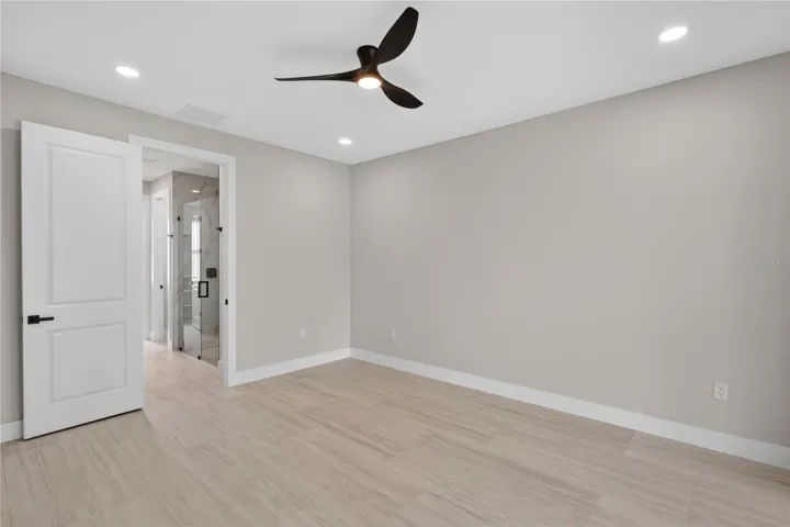 SPACIOUS PRIMARY BATHROOM offers a spa-like retreat with comfort, functionality & elegant finishes!