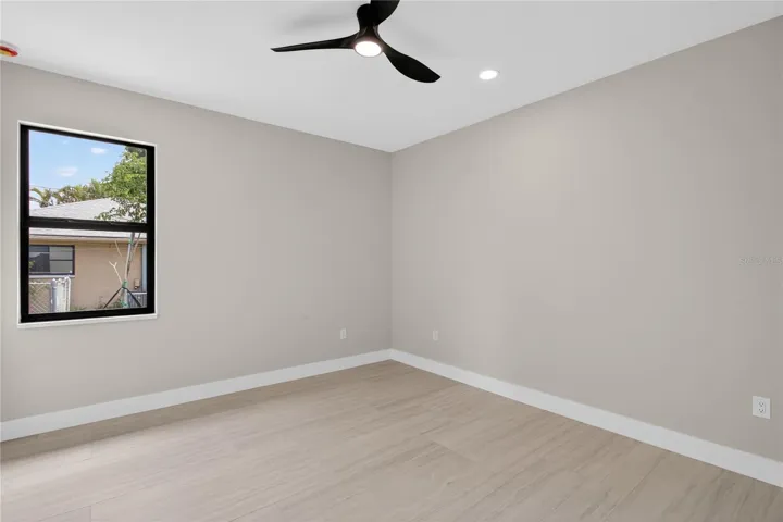 THIRD GUEST BEDROOM offers comfortable accommodations with a bright and inviting layout for family or guests!