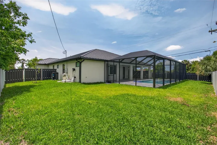 LARGE FENCED YARD offers added privacy, security & plenty of space for outdoor enjoyment!