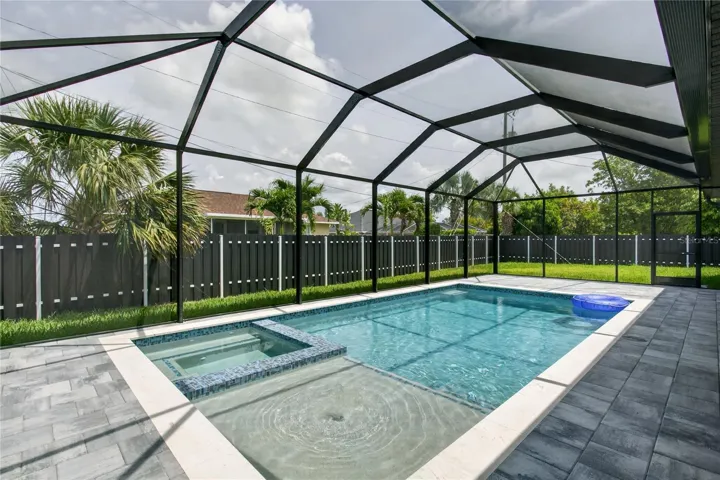 SCREENED LANAI provides PERFECT SETTING TO RELAX in SPA, SWIM in HEATED POOL, or HOST UNFORGETTABLE BBQs while enjoying THE BEST OF SWFL LIVING!