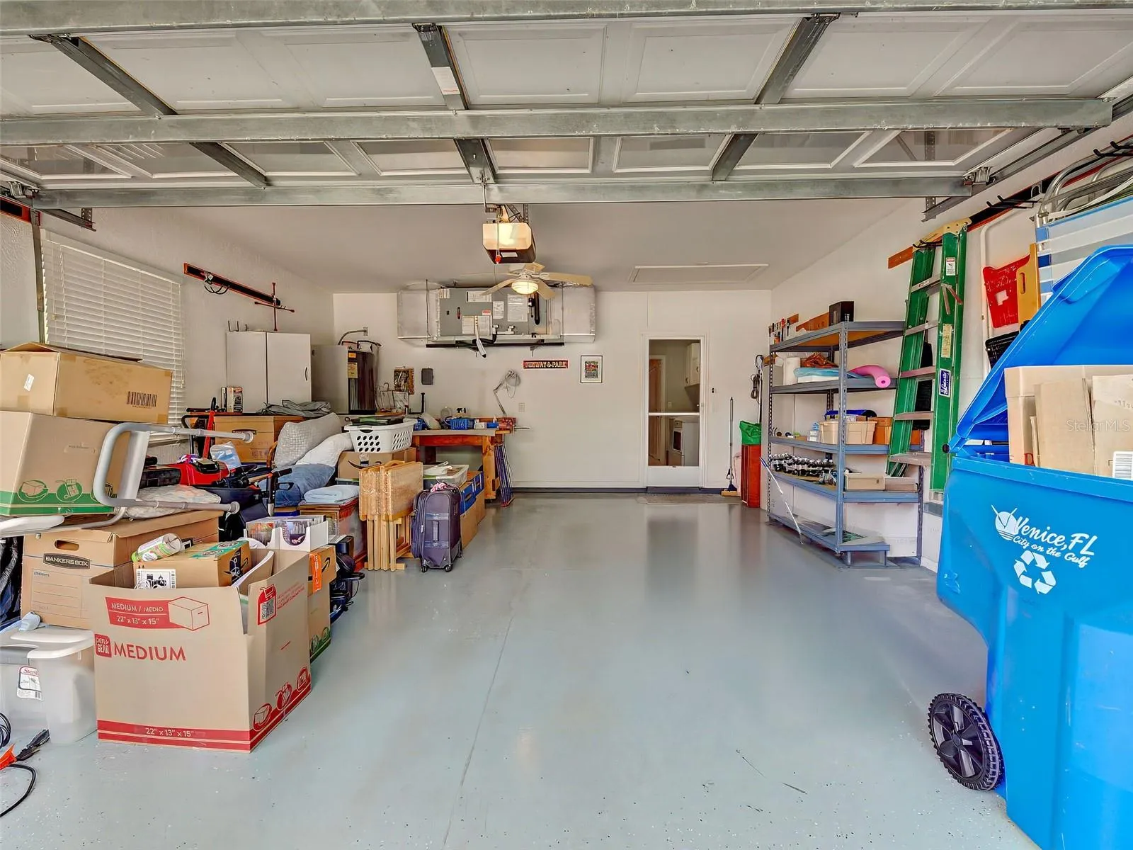 The garage is clean and the floor covering is only two years old.