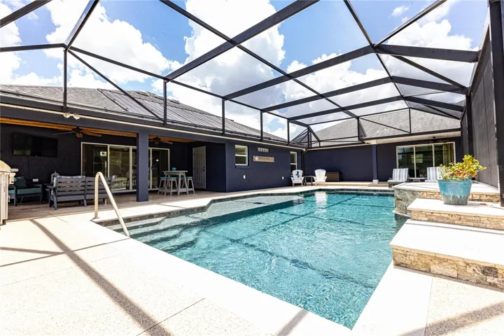 Enclosed pool with entertainment area