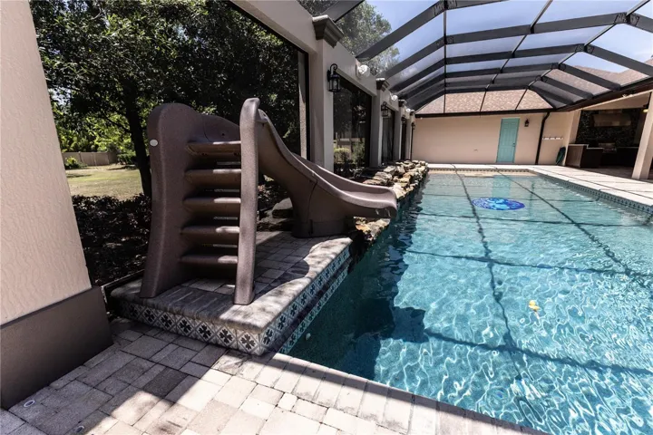 Pool includes a slide