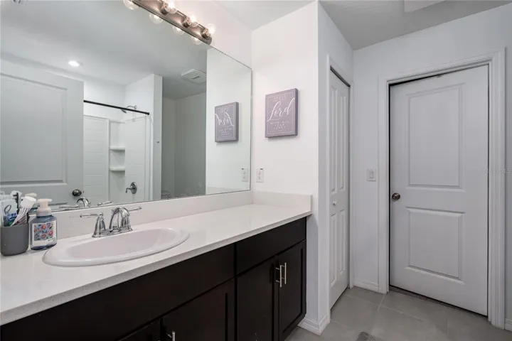 Primary bathroom with large walk in closet